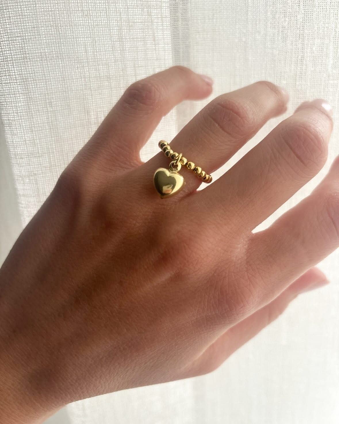 Anello elastico microsfere con ciondolo bombato