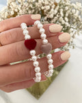 Bracciale elastico perle e cuore in velluto