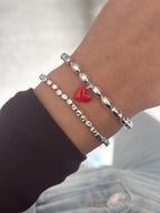 Bracciale semi e cuore rosso