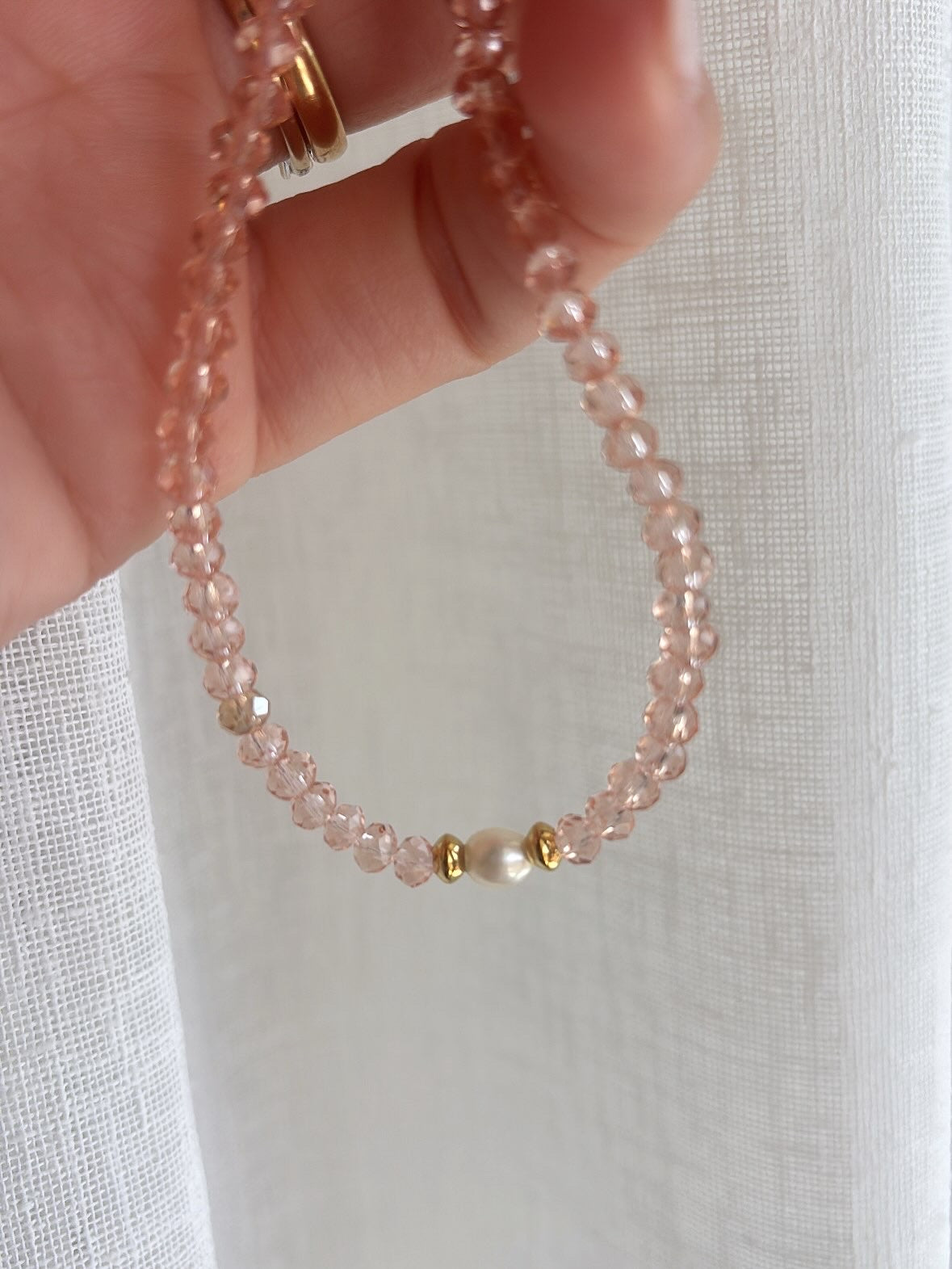 Collana mezzi cristalli con perlina centrale